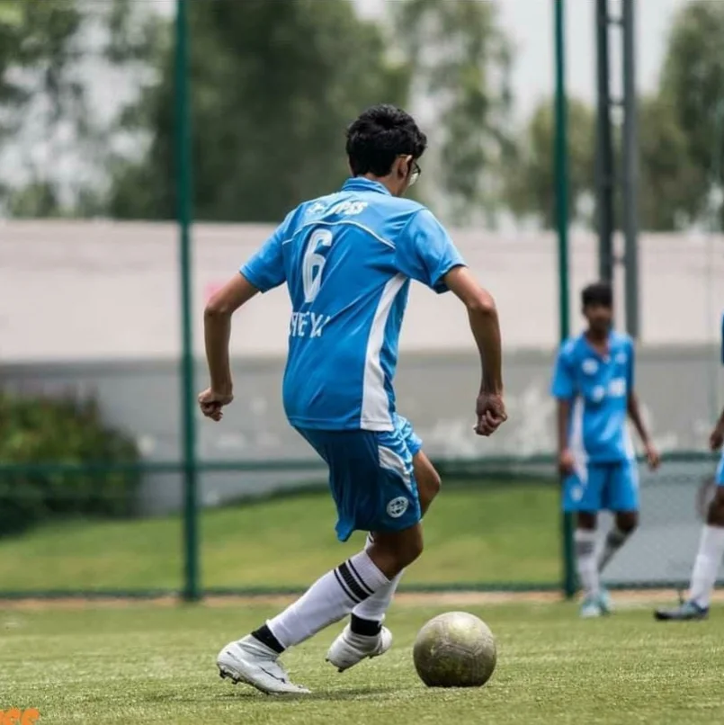 BPSS player stepping up for a penalty shootout during a tense knockout tournament match